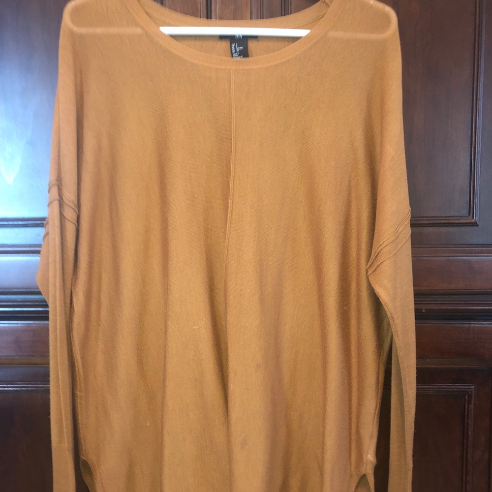 Thin copper sweater.